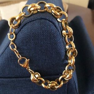 Gold tone link bracelet adj.from 7”to 7 1/4”lobster claw clasp.stainless steel